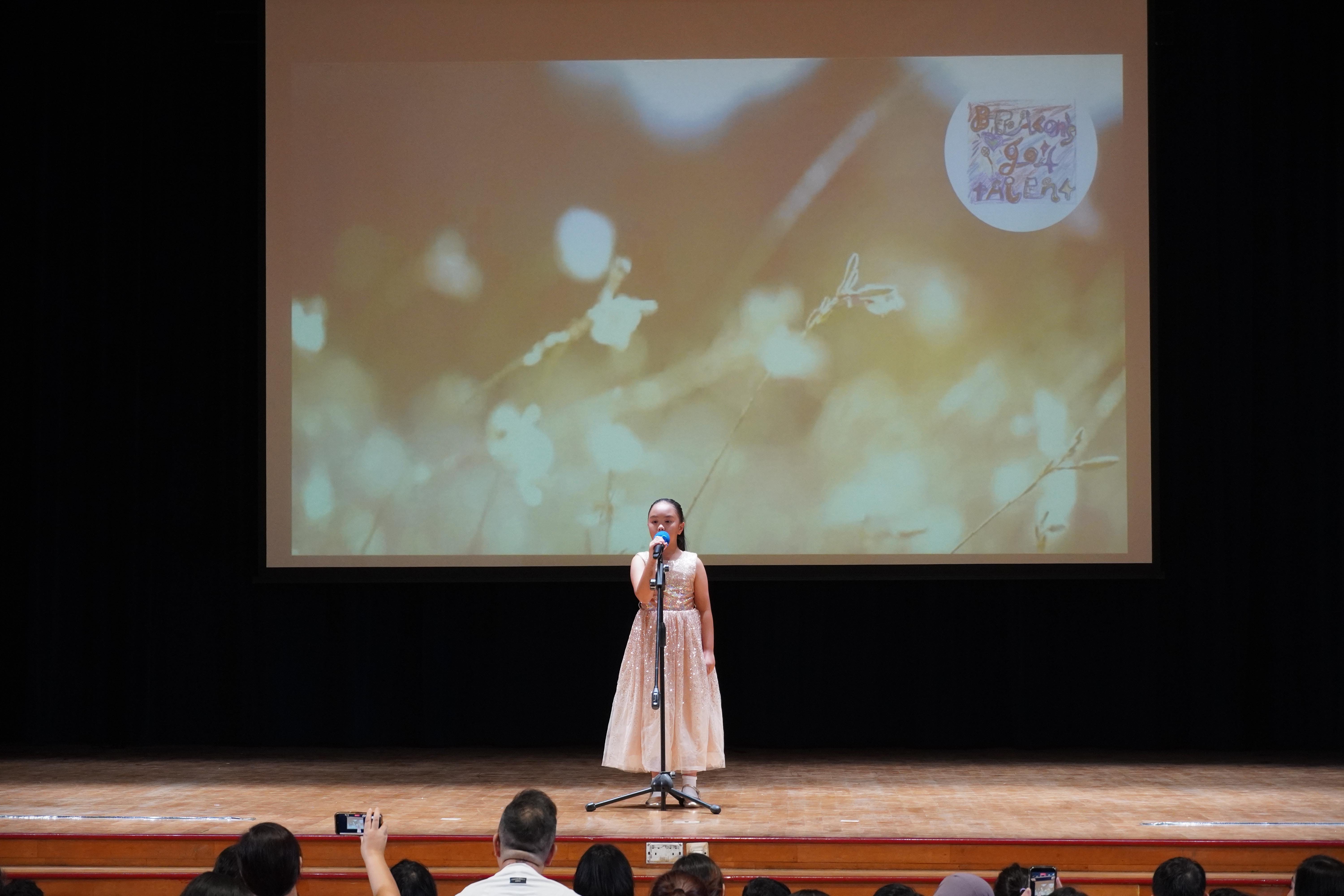Letting her voice take centre stage! Our student performed confidently in front of the audience.